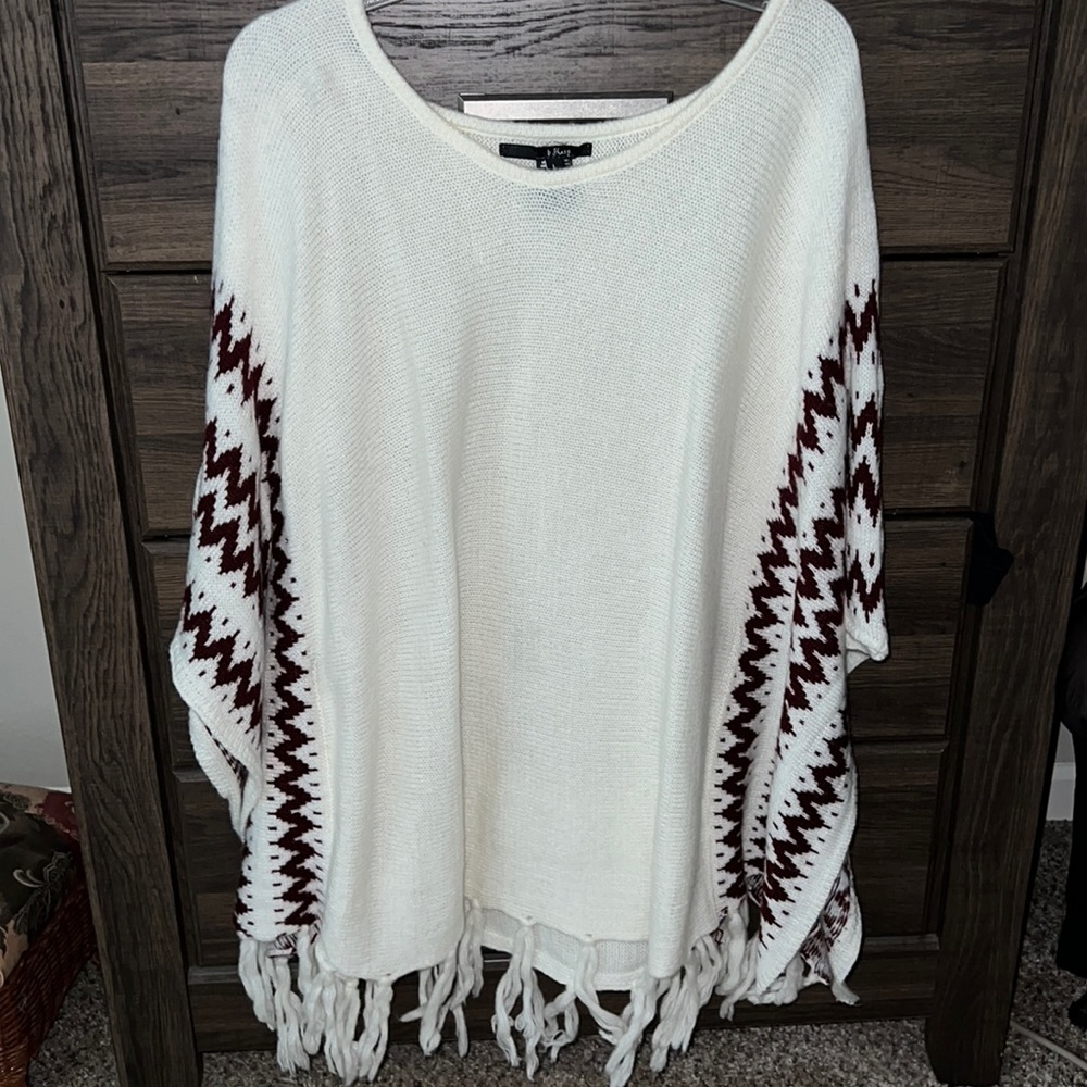 White and burgundy poncho